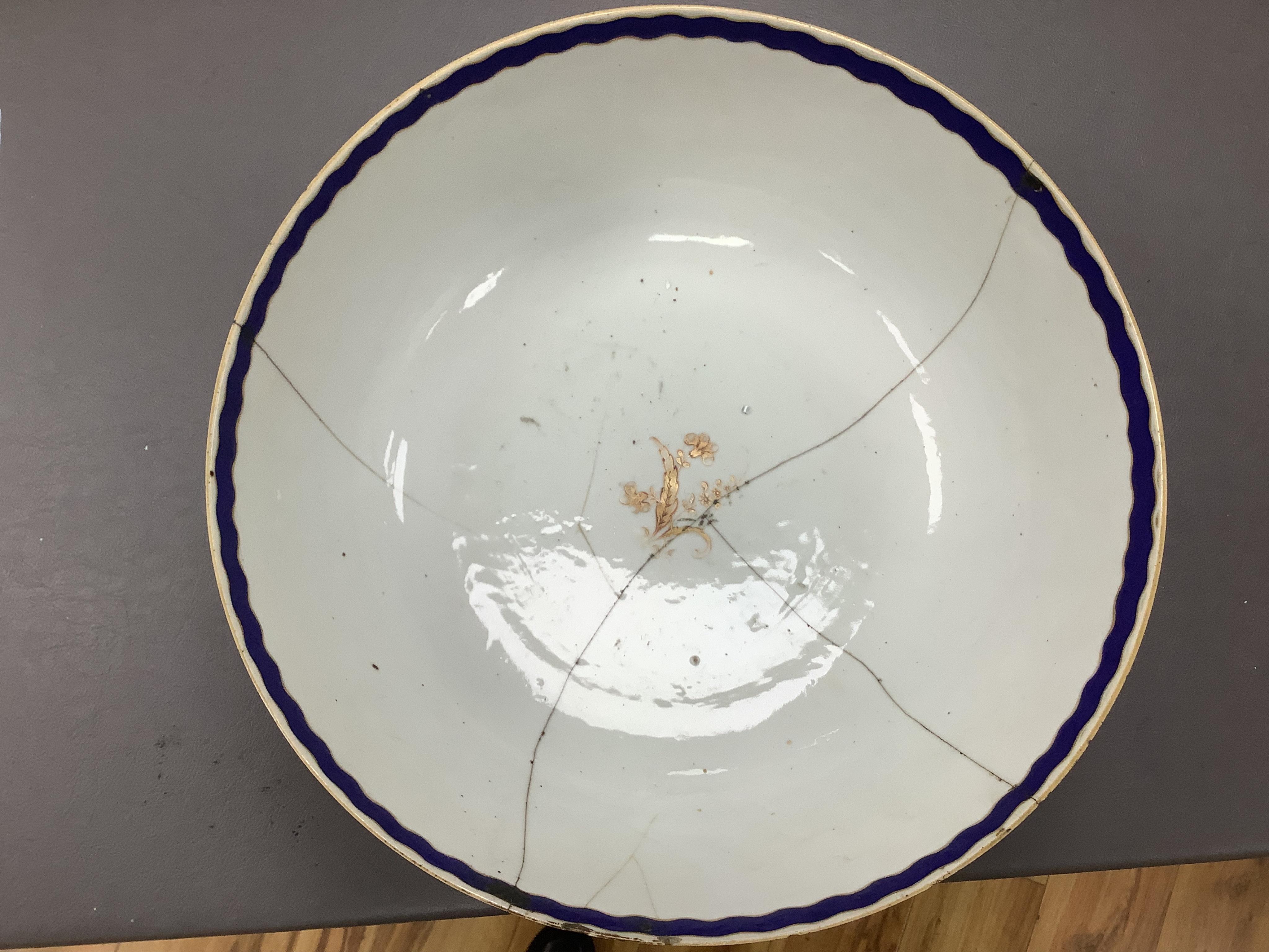 An 18th/19th century Chinese tea bowl and saucer, a punch bowl, two tea bowls and a Paris porcelain vase, largest 31cm